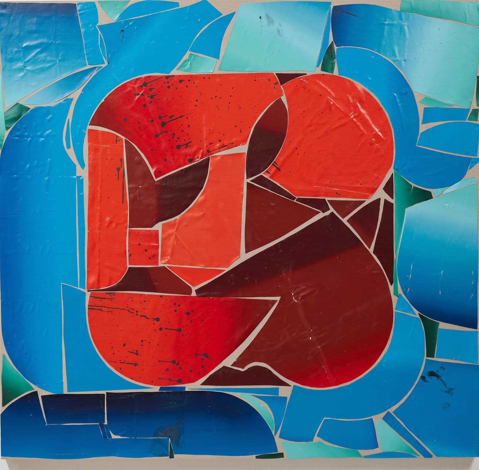 Mosaic of cracked paint shards, a red-orange mass over blue fragments.
