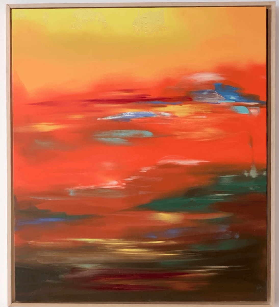 Atmospheric abstract of molten orange and red with blue and teal streaks.