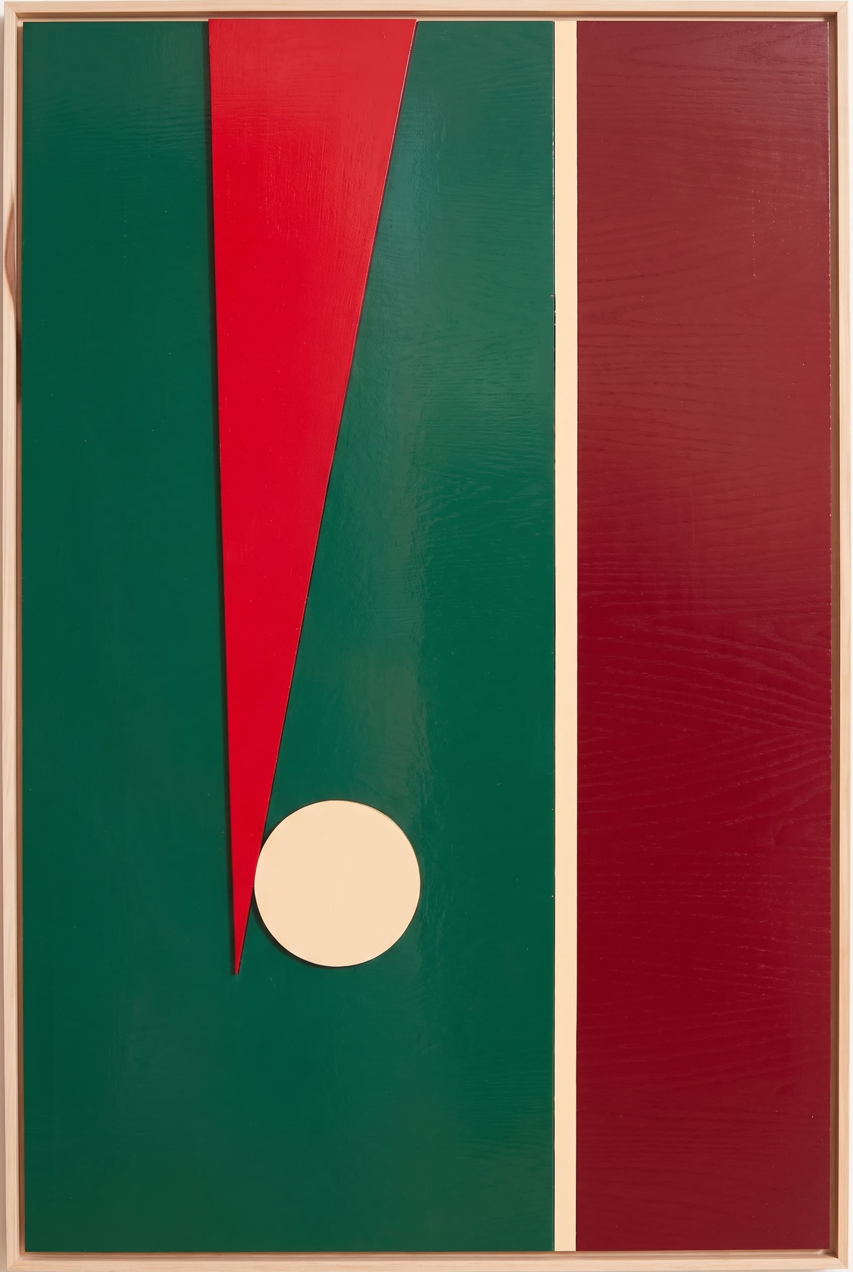 Green relief panel with a red triangle, cream circle and maroon stripe.