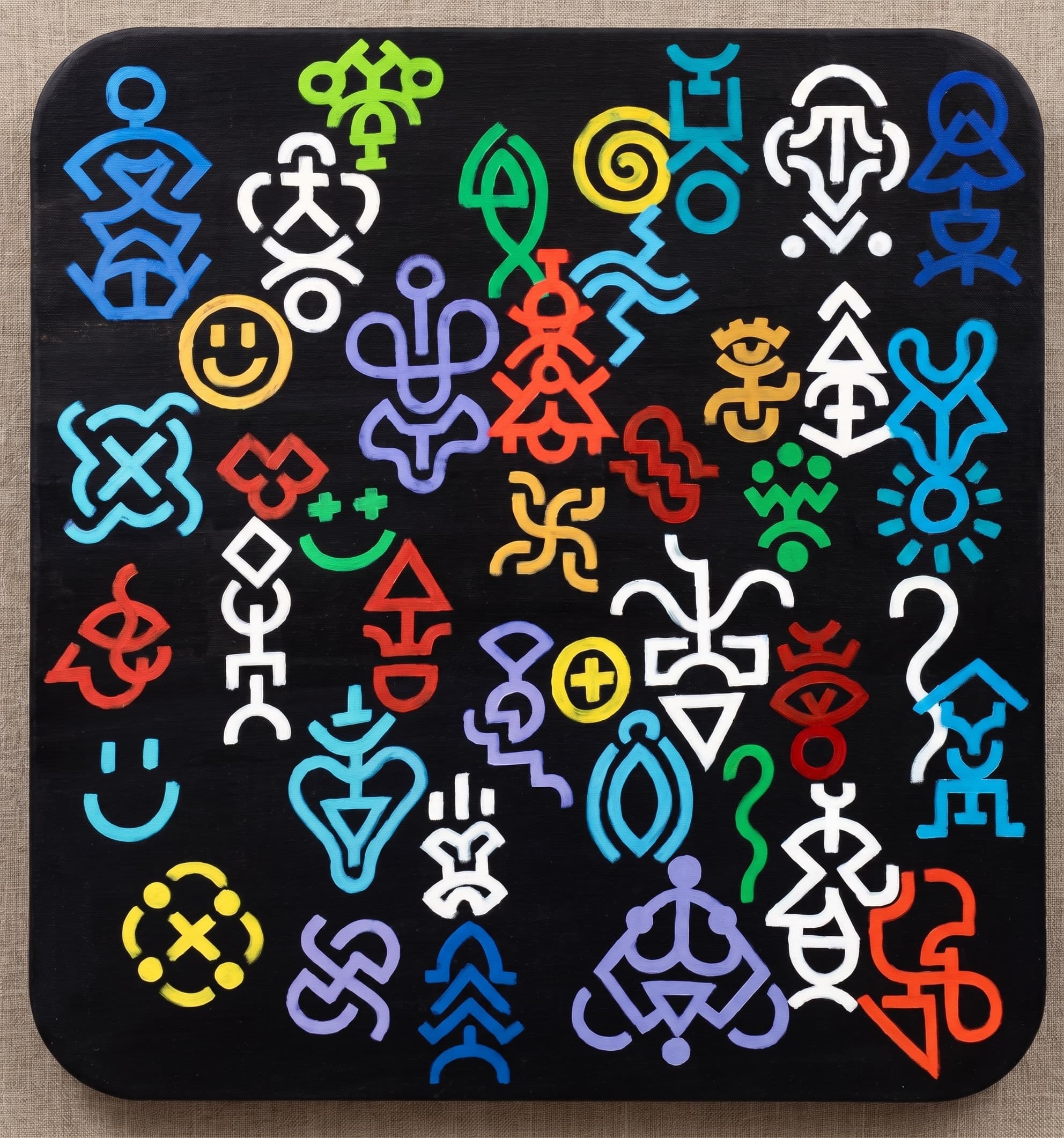 Dark panel scattered with dozens of small multicolor pictograph symbols.
